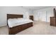 Spacious bedroom with carpeted floor and large bed at 821 Sun Burst Rd, Winter Haven, FL 33880