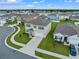 Two-story house in a residential neighborhood with a curved sidewalk at 821 Sun Burst Rd, Winter Haven, FL 33880
