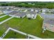 Aerial view of house with large backyard in residential area at 821 Sun Burst Rd, Winter Haven, FL 33880