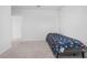 Simple bedroom with carpeted floor and a bed at 821 Sun Burst Rd, Winter Haven, FL 33880