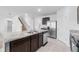 Spacious kitchen featuring dark wood cabinets and granite countertops at 821 Sun Burst Rd, Winter Haven, FL 33880