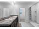 Double vanity bathroom with shower and toilet at 821 Sun Burst Rd, Winter Haven, FL 33880