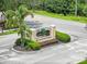 Close-up of Squire's Grove community entrance sign at 821 Sun Burst Rd, Winter Haven, FL 33880