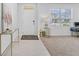 Spacious entryway with tile floors and a view to the living room at 821 Sun Burst Rd, Winter Haven, FL 33880