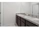 Clean bathroom with double vanity and granite countertop at 821 Sun Burst Rd, Winter Haven, FL 33880