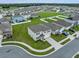Aerial view of two-story house and surrounding neighborhood at 821 Sun Burst Rd, Winter Haven, FL 33880