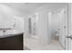 Bathroom with shower, toilet and double vanity at 821 Sun Burst Rd, Winter Haven, FL 33880