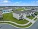 Aerial view of two-story house and surrounding neighborhood at 821 Sun Burst Rd, Winter Haven, FL 33880