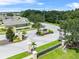 Entrance to the Squire's Grove community with landscaping and signage at 821 Sun Burst Rd, Winter Haven, FL 33880