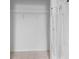 Empty closet with wire shelving and ironing board at 821 Sun Burst Rd, Winter Haven, FL 33880