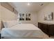 Spacious bedroom with a king-size bed and stylish decor at 3625 Lily Ln, Davenport, FL 33897