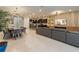 Open concept living space with kitchen, dining, and living room at 3625 Lily Ln, Davenport, FL 33897