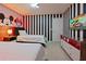 Fun ' bedroom with twin beds and Mickey Mouse theme at 3625 Lily Ln, Davenport, FL 33897