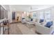 Spacious living room with hardwood floors and access to backyard at 905 Marabon Ave, Orlando, FL 32806