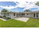 Spacious patio with pavers and a beautiful view of the backyard at 905 Marabon Ave, Orlando, FL 32806