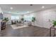 Bright living room with hardwood floors and comfortable seating at 905 Marabon Ave, Orlando, FL 32806