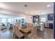 Bright kitchen with white cabinets, stainless steel appliances, and a large island at 905 Marabon Ave, Orlando, FL 32806