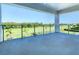 Spacious balcony overlooking a golf course at 1020 Jack Nicklaus Ct, Kissimmee, FL 34747