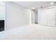 Simple bedroom with carpet, access to bathroom and closet at 1020 Jack Nicklaus Ct, Kissimmee, FL 34747