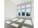 Bedroom with wall-to-wall windows and carpet at 1020 Jack Nicklaus Ct, Kissimmee, FL 34747