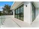 Spacious balcony with glass railings and access to interior at 210 Chelton Cir, Winter Park, FL 32789