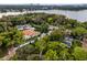 Property location shown with lake and city in background at 210 Chelton Cir, Winter Park, FL 32789