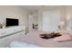 Spacious bedroom with a comfortable bed and built-in closet at 1001 Rivers Crossing St, Clermont, FL 34714