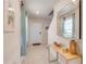 Light and airy entryway, featuring a console table and mirror at 1001 Rivers Crossing St, Clermont, FL 34714