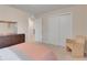Charming bedroom with a comfortable bed and a large closet at 1001 Rivers Crossing St, Clermont, FL 34714