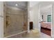 Bathroom with large glass shower and tile flooring at 8605 Bay Shore Cv, Orlando, FL 32836