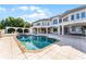 Large pool with stone coping and a spacious patio area at 8605 Bay Shore Cv, Orlando, FL 32836