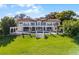 Luxury waterfront home with pool and expansive lawn at 8605 Bay Shore Cv, Orlando, FL 32836