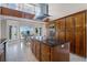 Spacious kitchen with island, stainless steel appliances, and granite countertops at 8605 Bay Shore Cv, Orlando, FL 32836