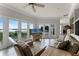 Bright living room with water views and access to balcony at 8605 Bay Shore Cv, Orlando, FL 32836