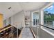 Bright hallway with tile floor and views to living areas at 8605 Bay Shore Cv, Orlando, FL 32836