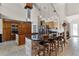 Eat-in kitchen with breakfast bar, ample cabinetry, and granite countertops at 8605 Bay Shore Cv, Orlando, FL 32836