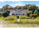 Lakefront home with private dock and lush landscaping; gorgeous views at 8605 Bay Shore Cv, Orlando, FL 32836