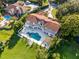 Stunning lakefront property featuring a large pool and expansive patio at 8605 Bay Shore Cv, Orlando, FL 32836