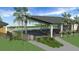 Community pool with covered seating and lounge area at 495 Preston Cove Dr, Saint Cloud, FL 34771