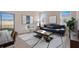 Bright and airy living room with comfy seating and large window at 3579 Dahlia Dr, Lake Hamilton, FL 33851