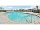 Relaxing community pool with steps and handrail at 3579 Dahlia Dr, Lake Hamilton, FL 33851