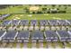Aerial view of townhouses near a golf course at 8889 Cabot Cliffs Dr # 104, Davenport, FL 33896