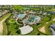 Aerial view of large community pool and lazy river at 8889 Cabot Cliffs Dr # 104, Davenport, FL 33896