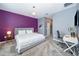 Spacious main bedroom with a king-size bed, and private balcony access at 8889 Cabot Cliffs Dr # 104, Davenport, FL 33896