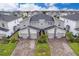 Aerial view of three-unit townhome community at 8889 Cabot Cliffs Dr # 104, Davenport, FL 33896