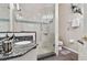 Clean bathroom with granite vanity, shower stall and toilet at 2907 Sunset Lakes Blvd, Kissimmee, FL 34747
