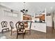 Dining area with glass-top table and chandelier at 2907 Sunset Lakes Blvd, Kissimmee, FL 34747