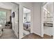 Hallway view of two bedrooms and a bathroom at 2907 Sunset Lakes Blvd, Kissimmee, FL 34747