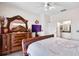 Spacious bedroom with ensuite bathroom and large dresser at 2907 Sunset Lakes Blvd, Kissimmee, FL 34747