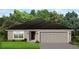 One-story home with gray siding, two-car garage, and landscaping at 4350 Sagefield Dr, St Cloud, FL 34773